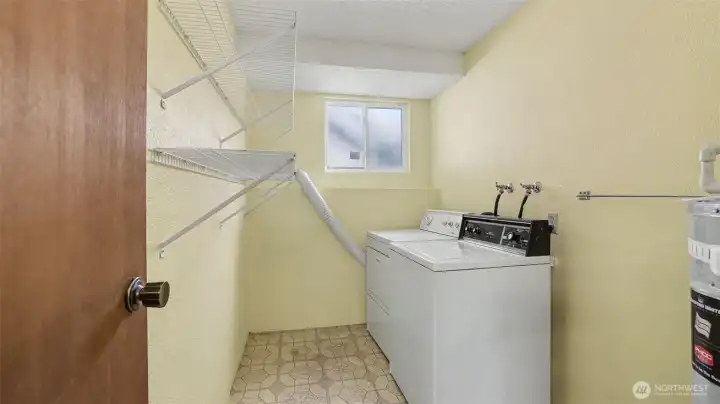 Dedicated laundry and utility area.