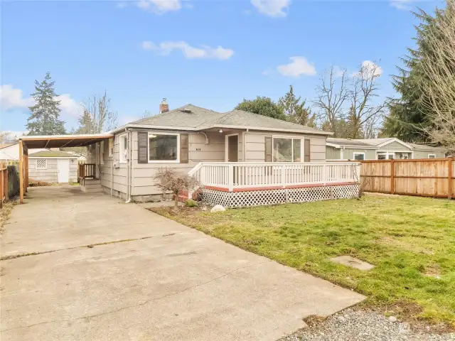 Long driveway with carport