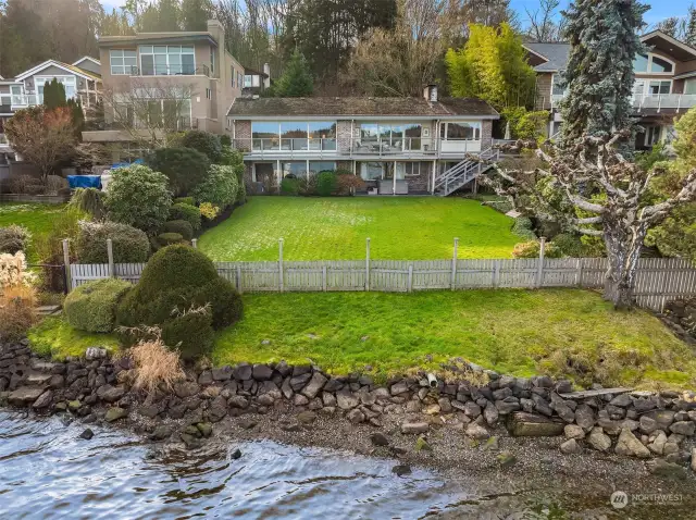 Waterside view of home - dock not shown in foreground.