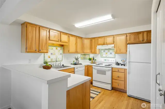 Great Kitchen layout with plenty of counter space and cabinetry.