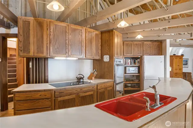 Another view of the kitchen. The stairs on the back left lead up to the bonus room in the pedestal.