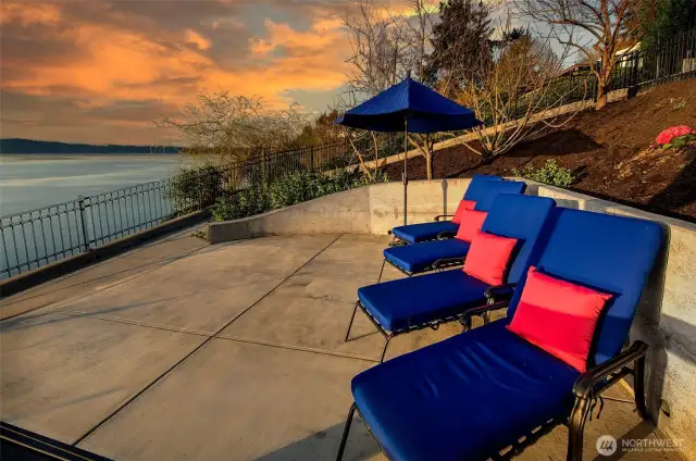 Timeless charm crowns the cove at 7314 Eastside Drive NE. This well-preserved 1964 Cape Cod–style home sits atop the estate’s terraced hillside, offering sweeping views across Caledonia Cove to the Salish Sea and Olympic Mountains. With over 11,000 square feet of grounds, a west-facing covered deck, and vintage coastal character, 7314 is ready for its next act.