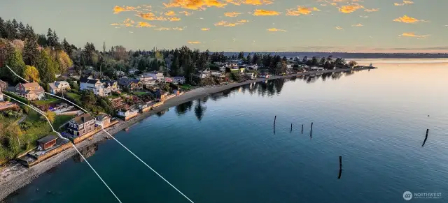 This dual-parcel, street-to-shore retreat includes a Cape Cod residence (7314), a fully renovated Beach House, Coach House, Boat House, and expansive decks (7316). Thoughtfully terraced and beautifully connected, the layout allows for privacy, multigenerational living, generous parking, and potential future flexibility—all anchored by 65 feet of low-bank waterfront.