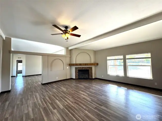 Huge family room with wood burning fireplace