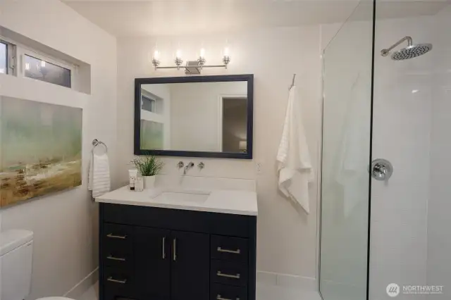 Completely remodeled primary bath with amazing walk in shower.
