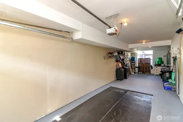 2 car tandem garage with tons of storage in back and under the stairs!