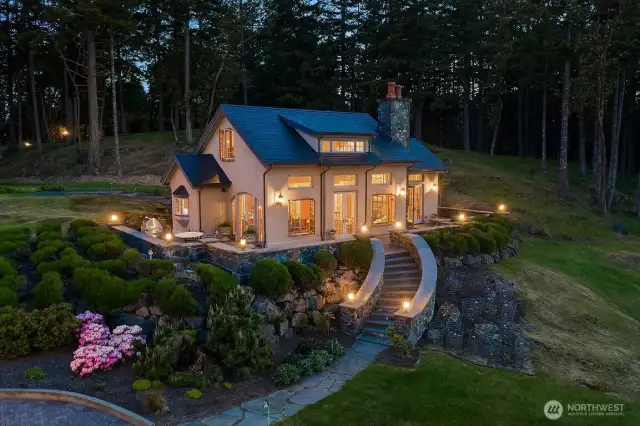 Guesthouse (~1,000 sq.ft.) is encircled by a walled terrace of Lynch Creek stone and  “True Blue” Pennsylvania bluestone leading to a curved exterior staircase that “makes  the heart sing.”