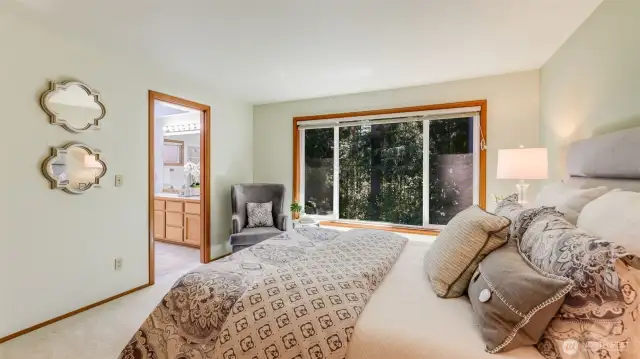 The primary suite is very private and peaceful.