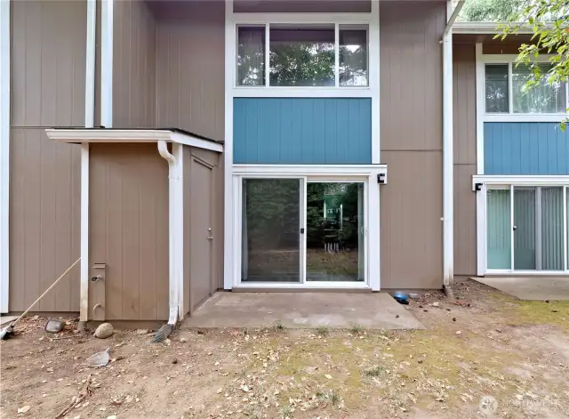 backyard with new patio and storage shed