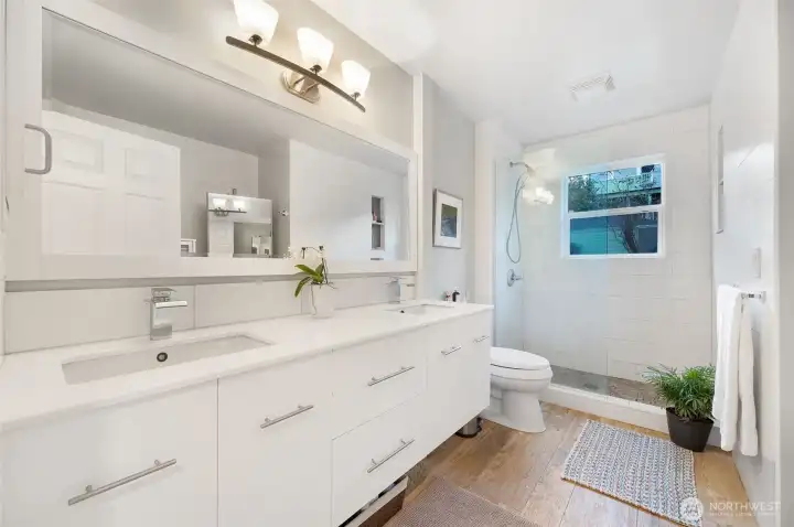 Upstairs bathroom with walk in shower.