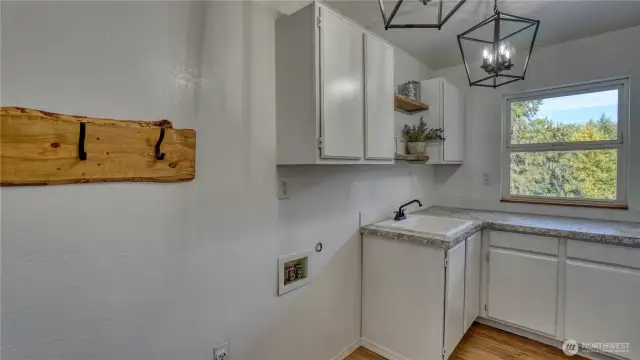 Laundry room with a mud area for after feeding the animals