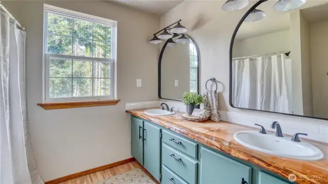 Remodeled upstair bathroom with live edge counter
