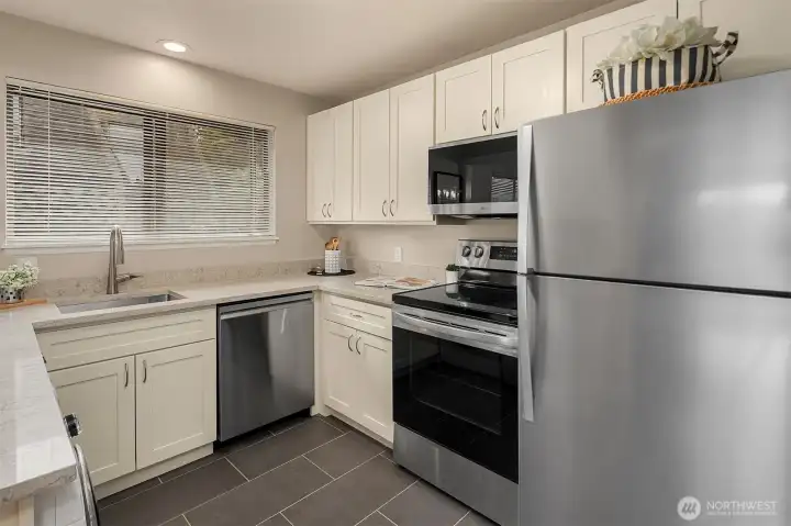 Remodeled kitchen with new appliances.
