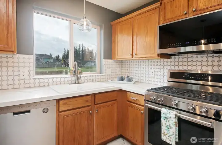Another shot of the kitchen - enjoy the view of the golf course!