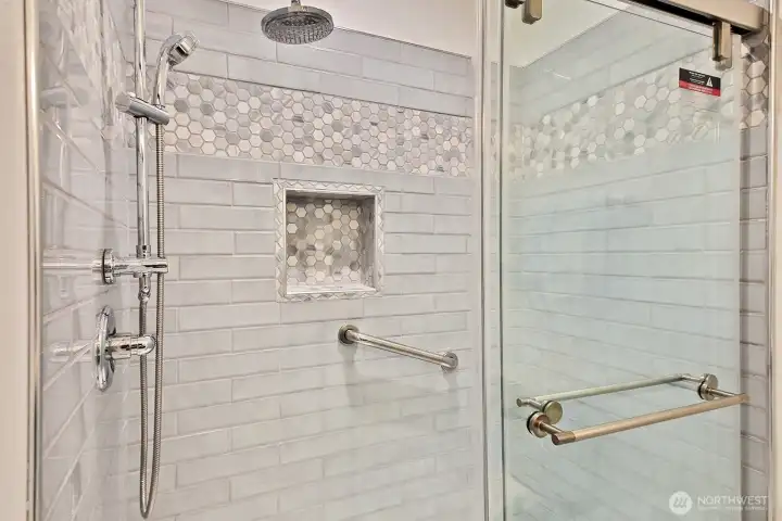 Beautifully updated 3/4 shower in the primary suite.