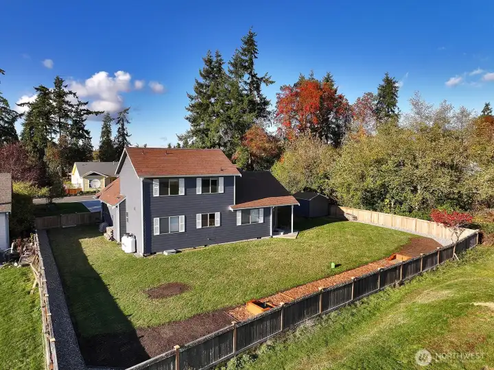 Another look at the fully fenced backyard and new gaming area.