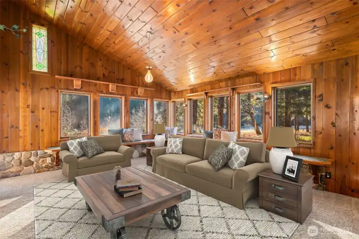 Amazing great room opens onto river and huge deck. Suggested furniture placement for easy access to door/views.