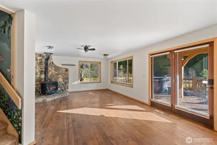 Gorgeous river rock wood burning stove heats the home easily