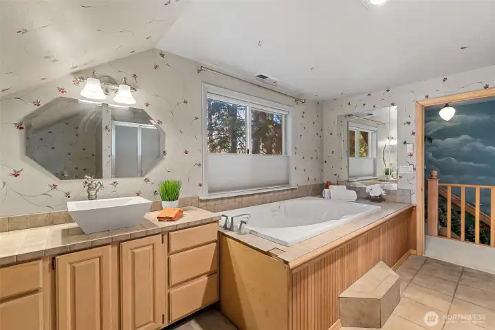 Master bath with soaking tub and separate shower