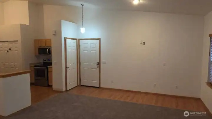 Entry area Owner had a free standing Elect. Fireplace and BIG Screen area