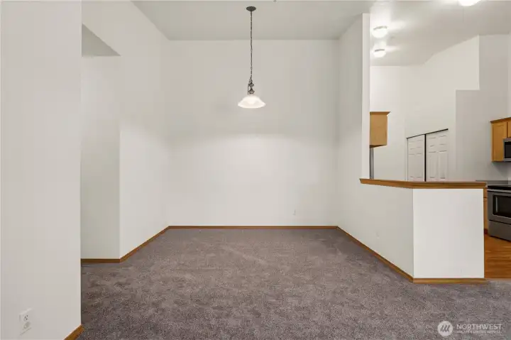 Dining room, hallway on the left.  Big Vaulted Ceilings, kitchen to the right