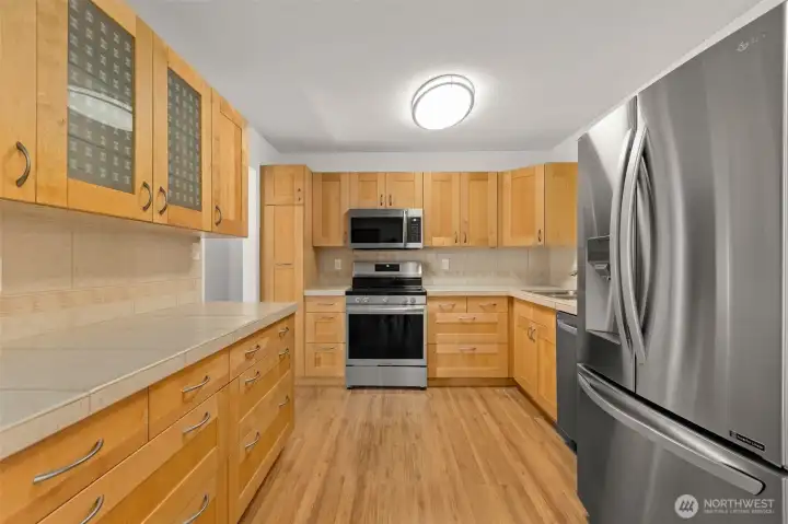 Looking to the stove from the dining area.