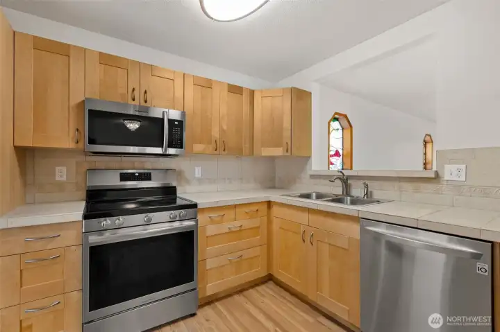 A peak of the charming stained glass windows.