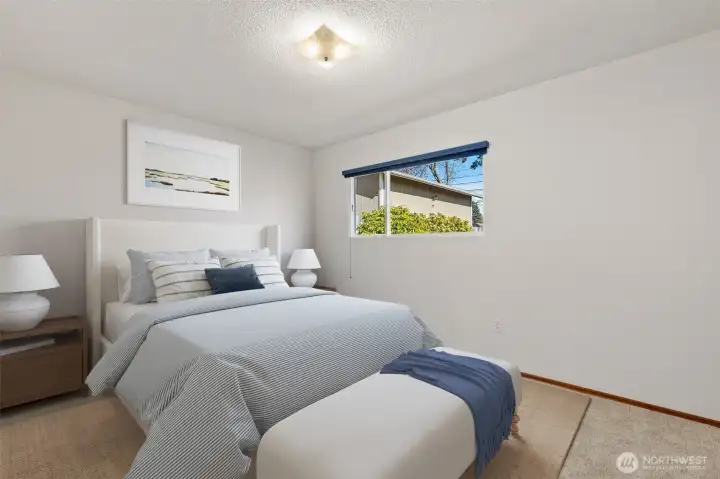 Primary bedroom down the hall (virtually staged)