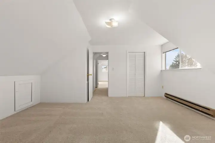 One of the upstairs bedrooms looking to the hallway.