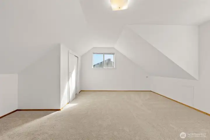 The other of the upstairs bedrooms, looking in from the hallway.