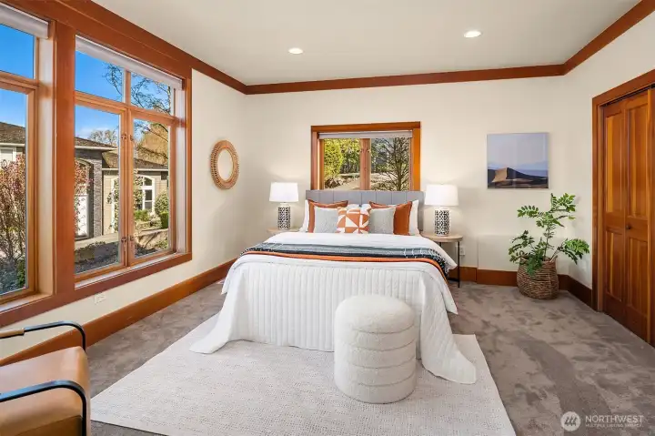 One of 2 bedrooms in middle level. Ample space and views.