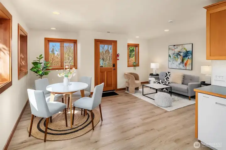 Cozy apartment with full height ceilings and access to lush garden