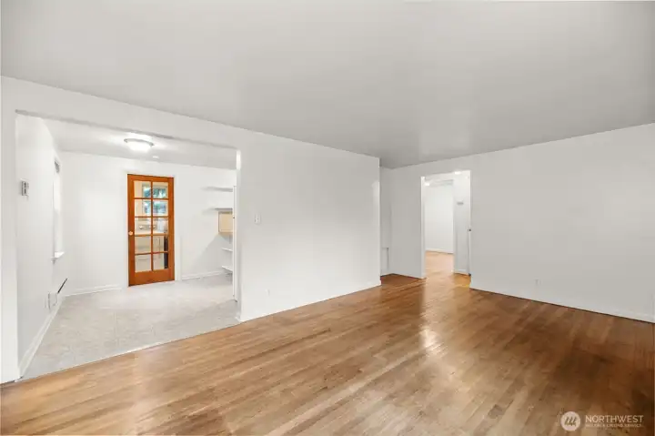 Inviting living room with classic hardwood floors and great natural light.