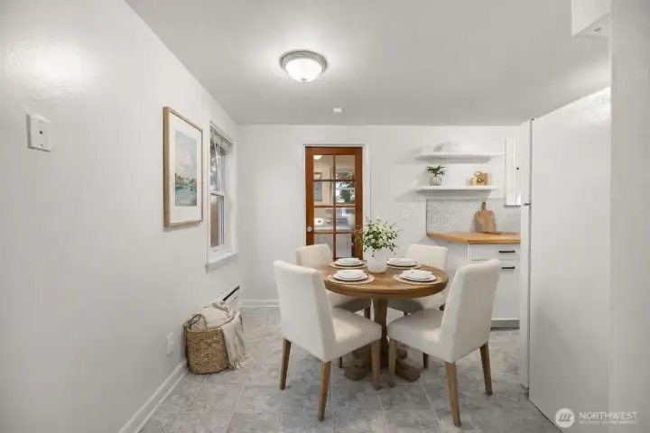 Virtually staged kitchen highlighting the cozy space and practical design.