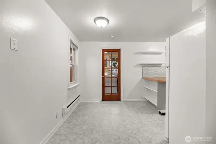 Inviting dining space with natural light, ideal for a cozy table setting.