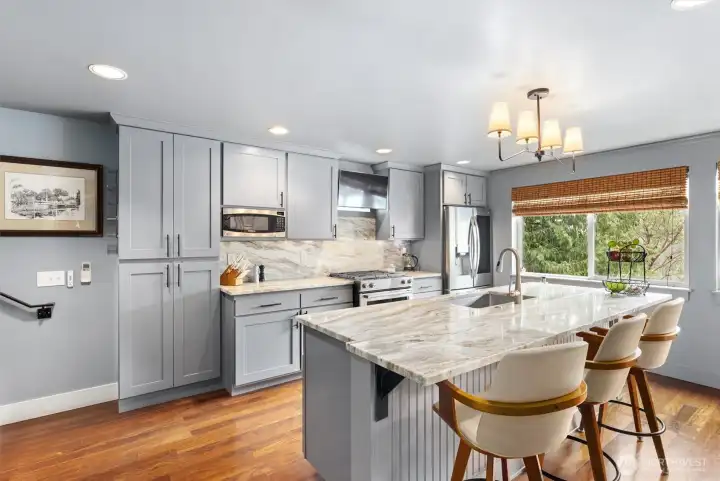 Chef’s kitchen with granite island & counters