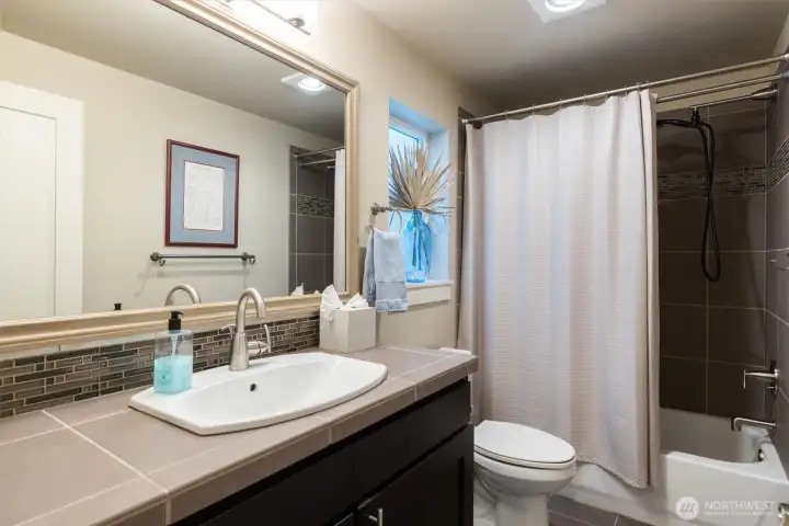 Updated bath with modern finishes