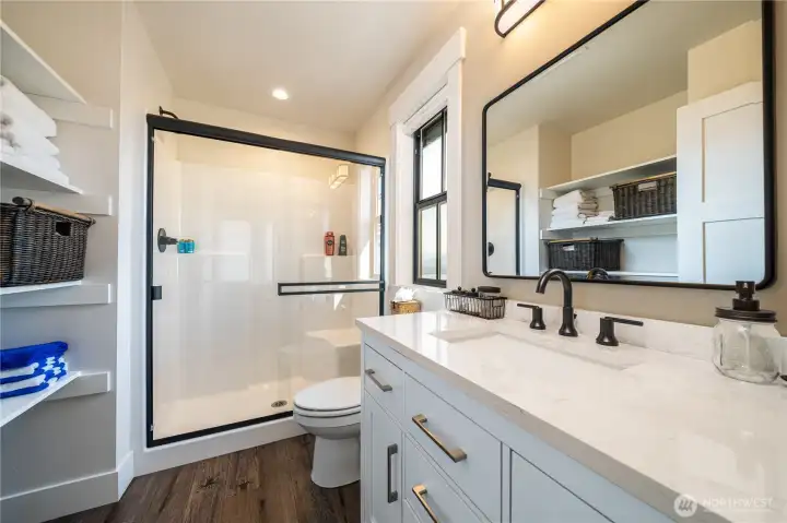 Upper level bedroom 2 en-suite bathroom.