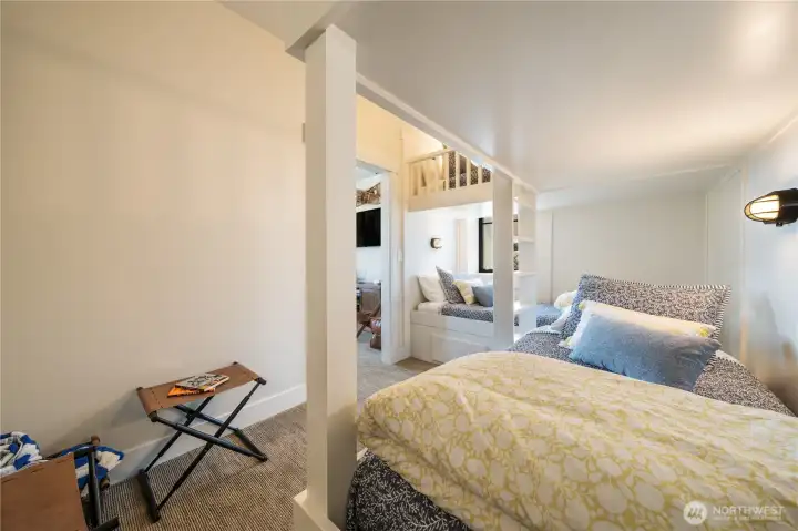 Lower level bunk room with 4 custom built-in bunks.