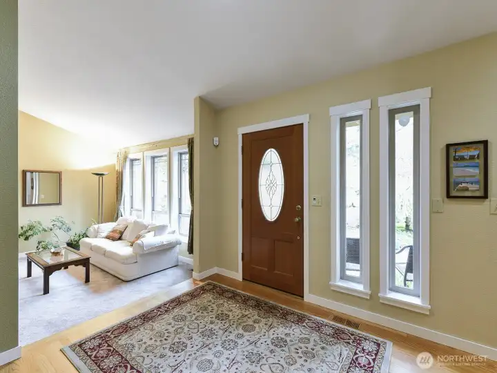 Welcome home!  Main level hosts formal living room, dining room, kitchen eating area, kitchen, family room and powder room.