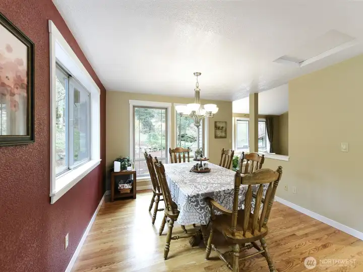 Large entertainment sized dining room facing front of house.