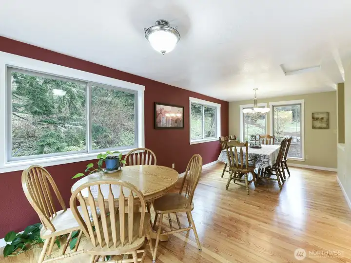 Kitchen eating area can extend the dining room space.  Plenty of room for an extra long table, or two separate eating areas.