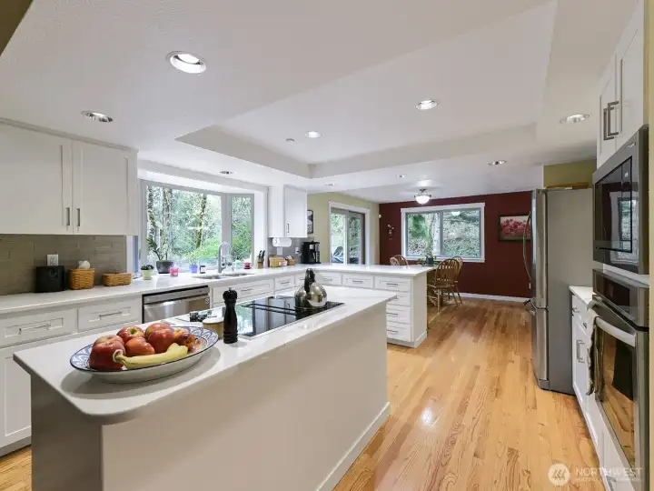 Kitchen faces VERY private backyard, and entertainment sized deck.