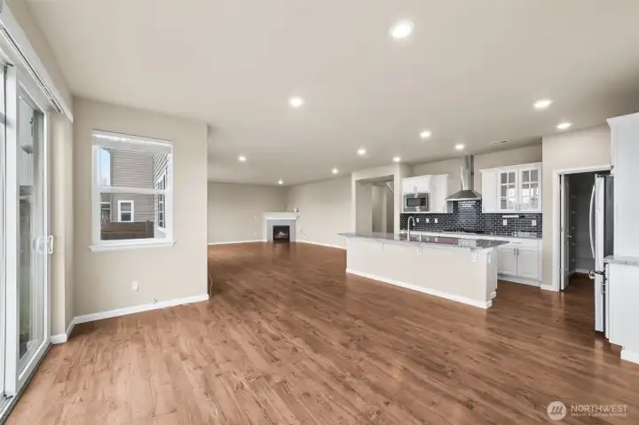 View of kitchen and great room from dining room