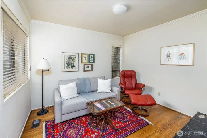 This main floor bedroom is the perfect spot for a den or in home office.