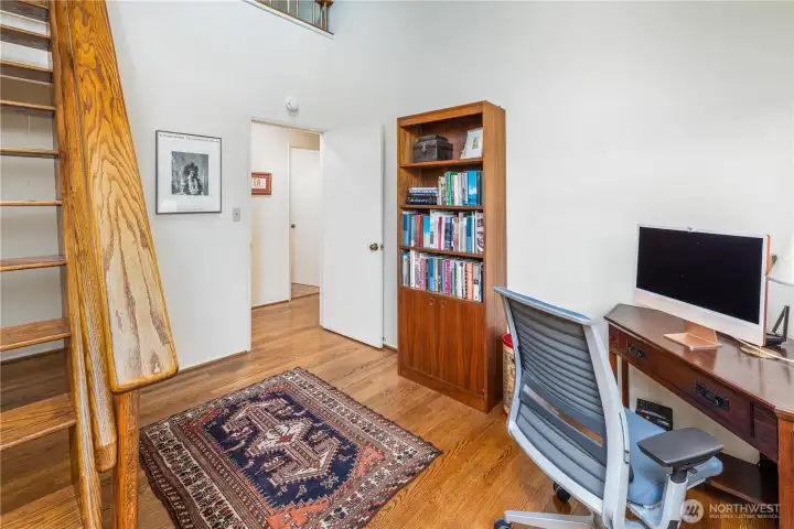 This versatile third bedroom offers flexibility for guests, a home office, or creative space, with a unique staircase leading to a charming loft above. The loft provides an additional bonus area, perfect for a guest retreat, reading nook, or peaceful meditation space.
