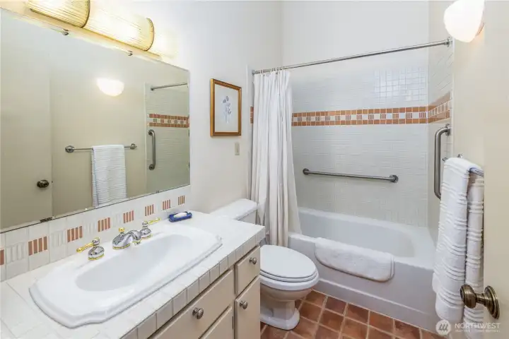The full bath is conveniently located outside the two upstairs bedrooms.