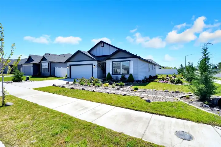 Corner-lot setting with enhanced curb appeal.