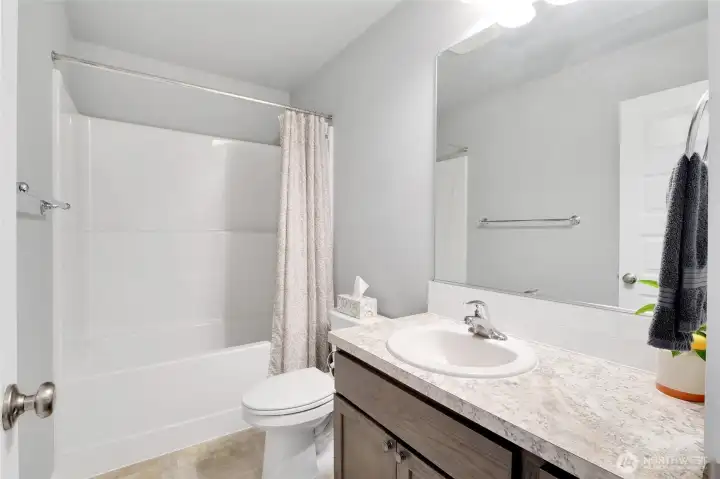 Main bath between bedroom 1 and bedroom 2.