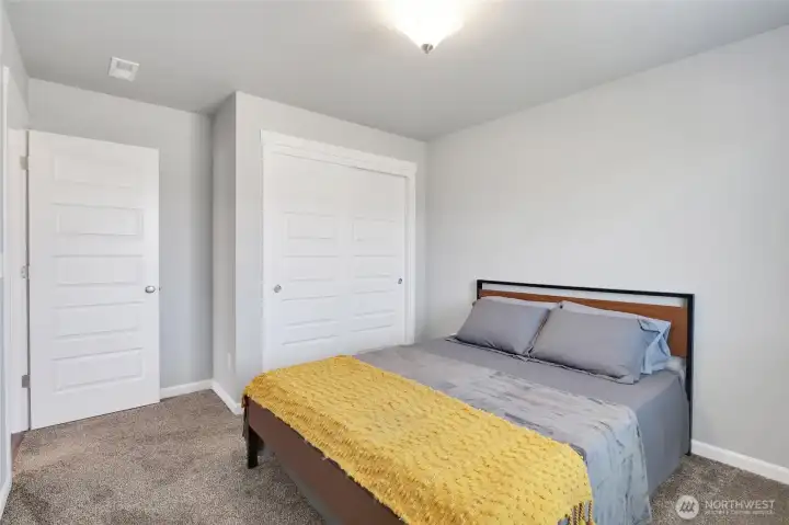 Bedroom number 2 showing closet space.